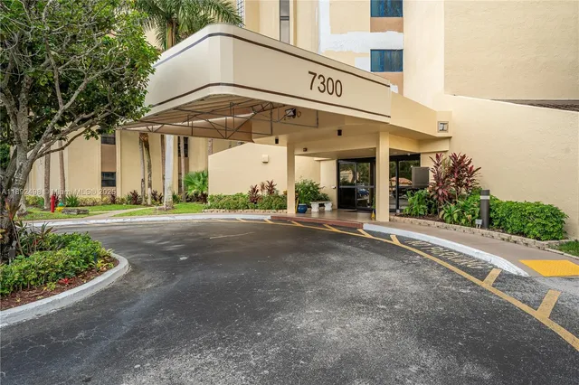 a view of a building with a street