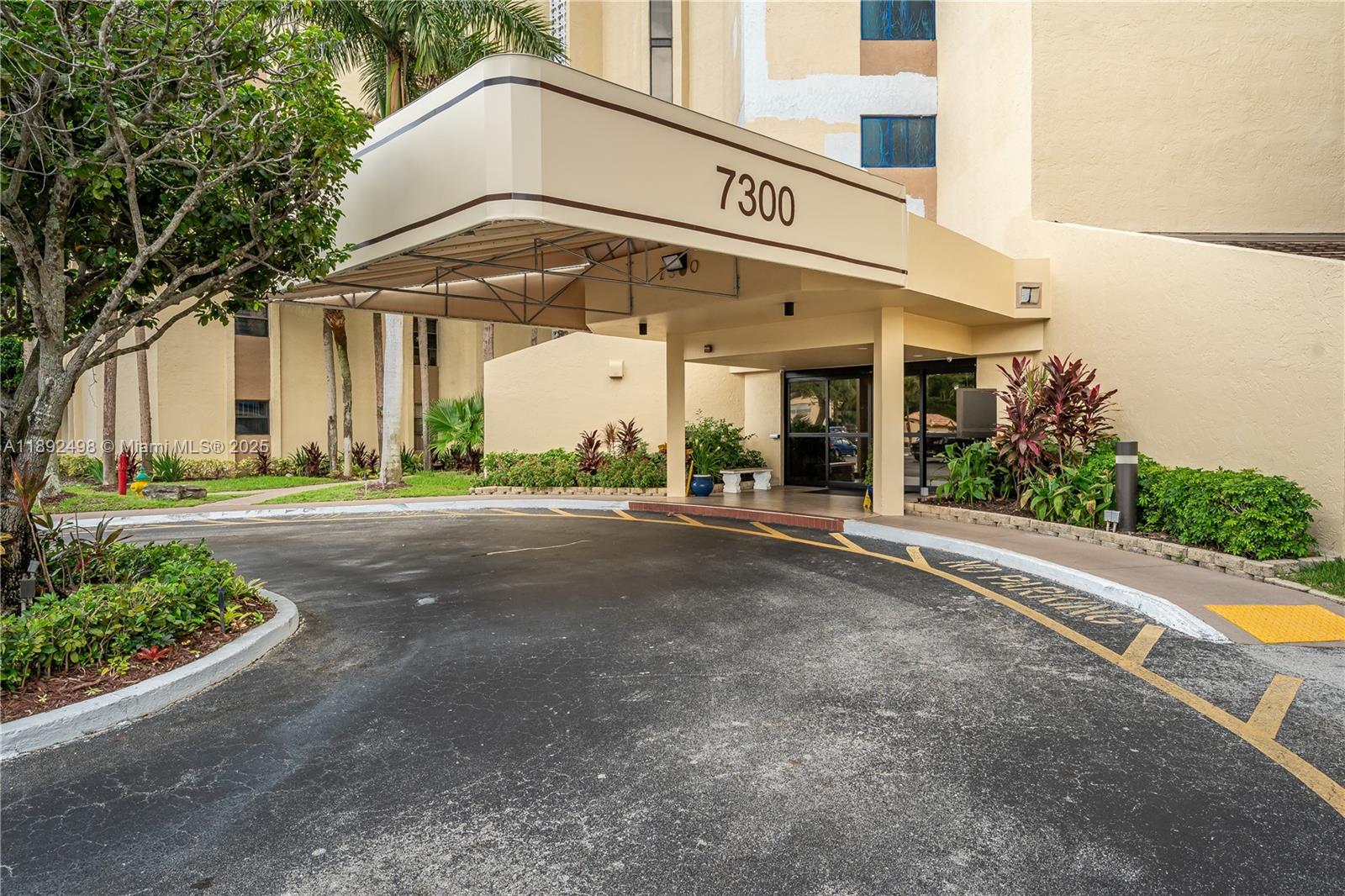 7300 Radice Court, Unit 109 Lauderhill, FL 33319 - Photo 29 of 35 a view of a building with a street