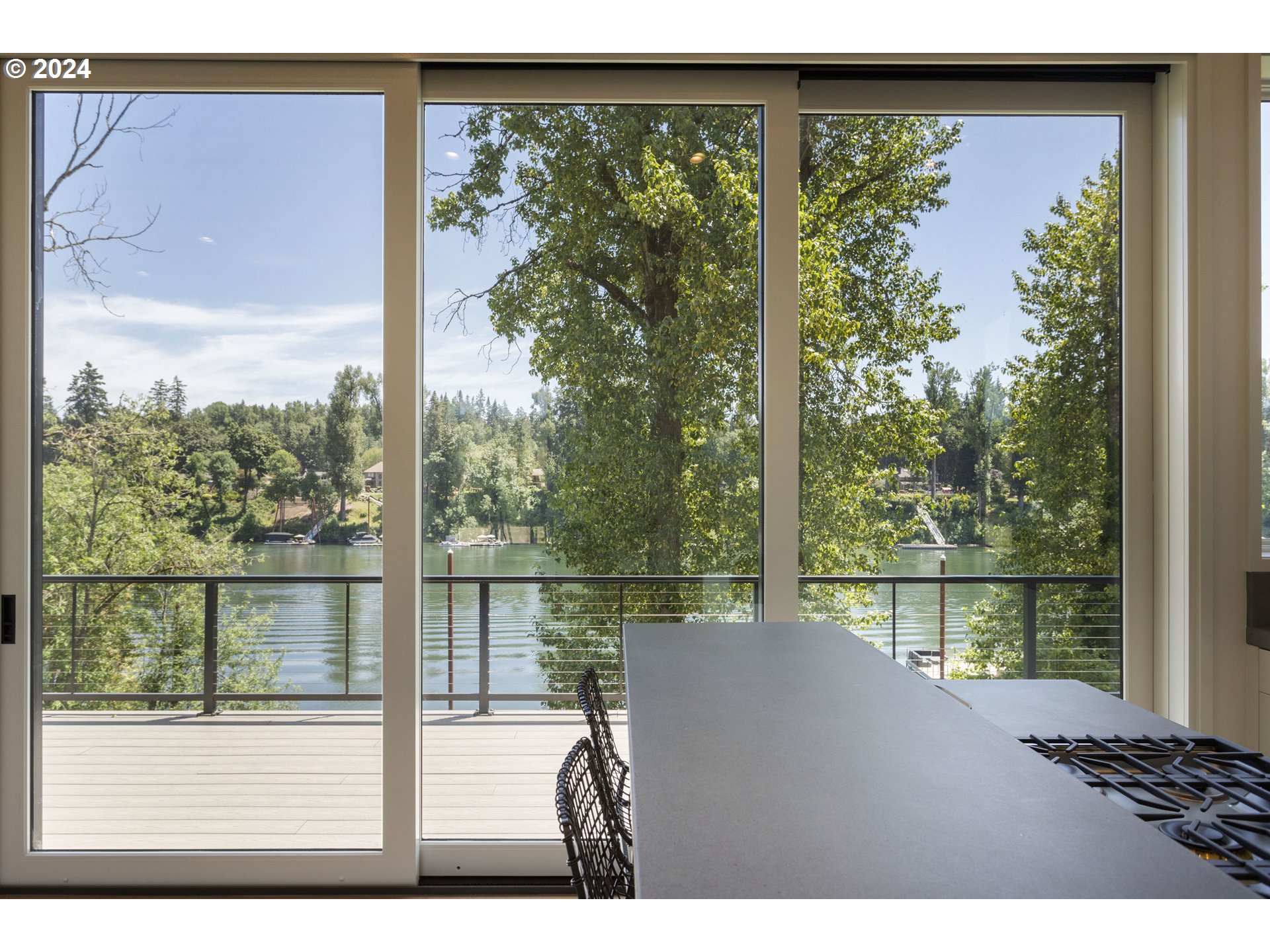 16450 Southwest Wilsonville Road Wilsonville, OR 97070 - Photo 16 of 40 a view of a lake from a window