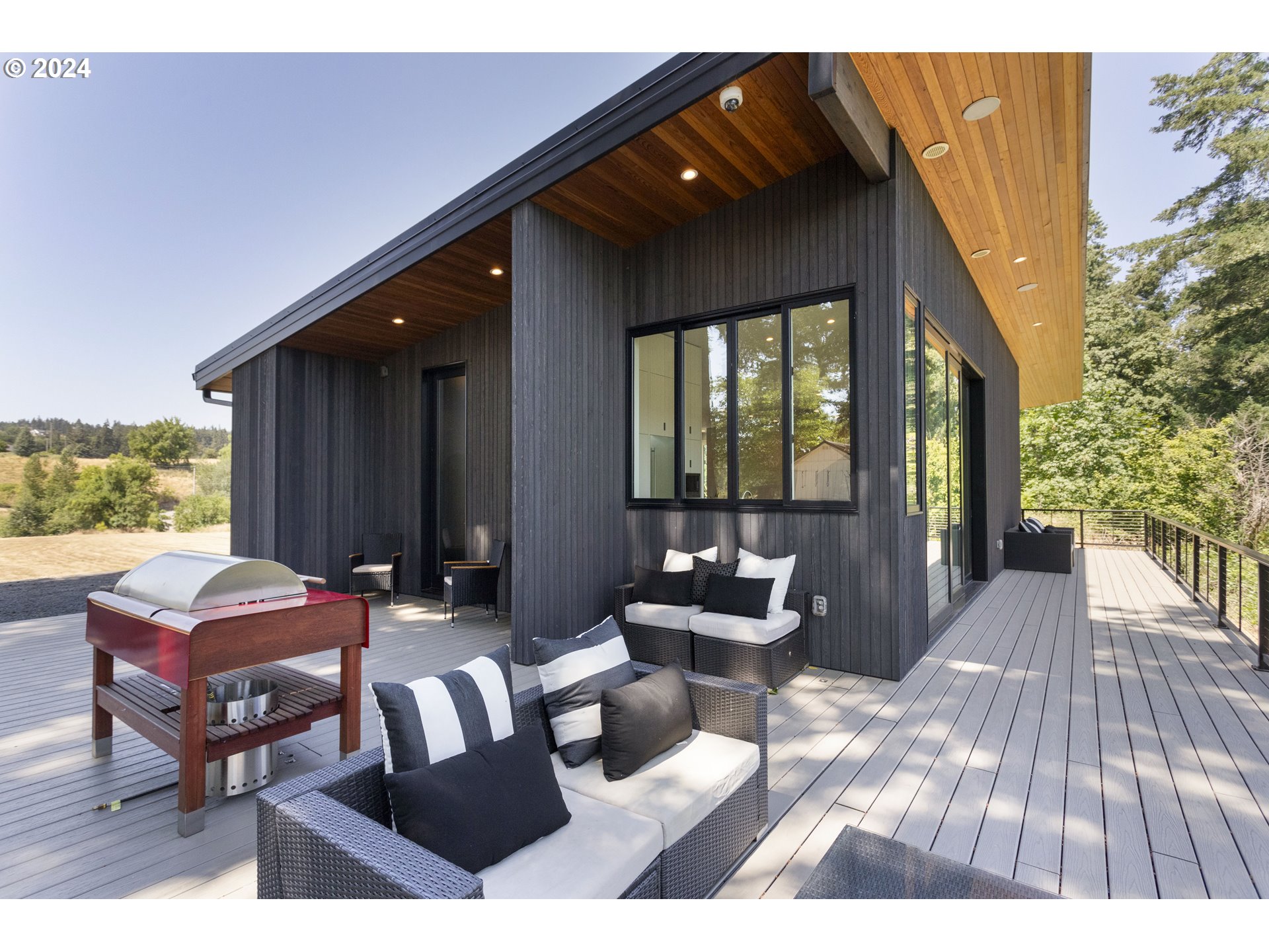 16450 Southwest Wilsonville Road Wilsonville, OR 97070 - Photo 5 of 40 a outdoor space with patio furniture