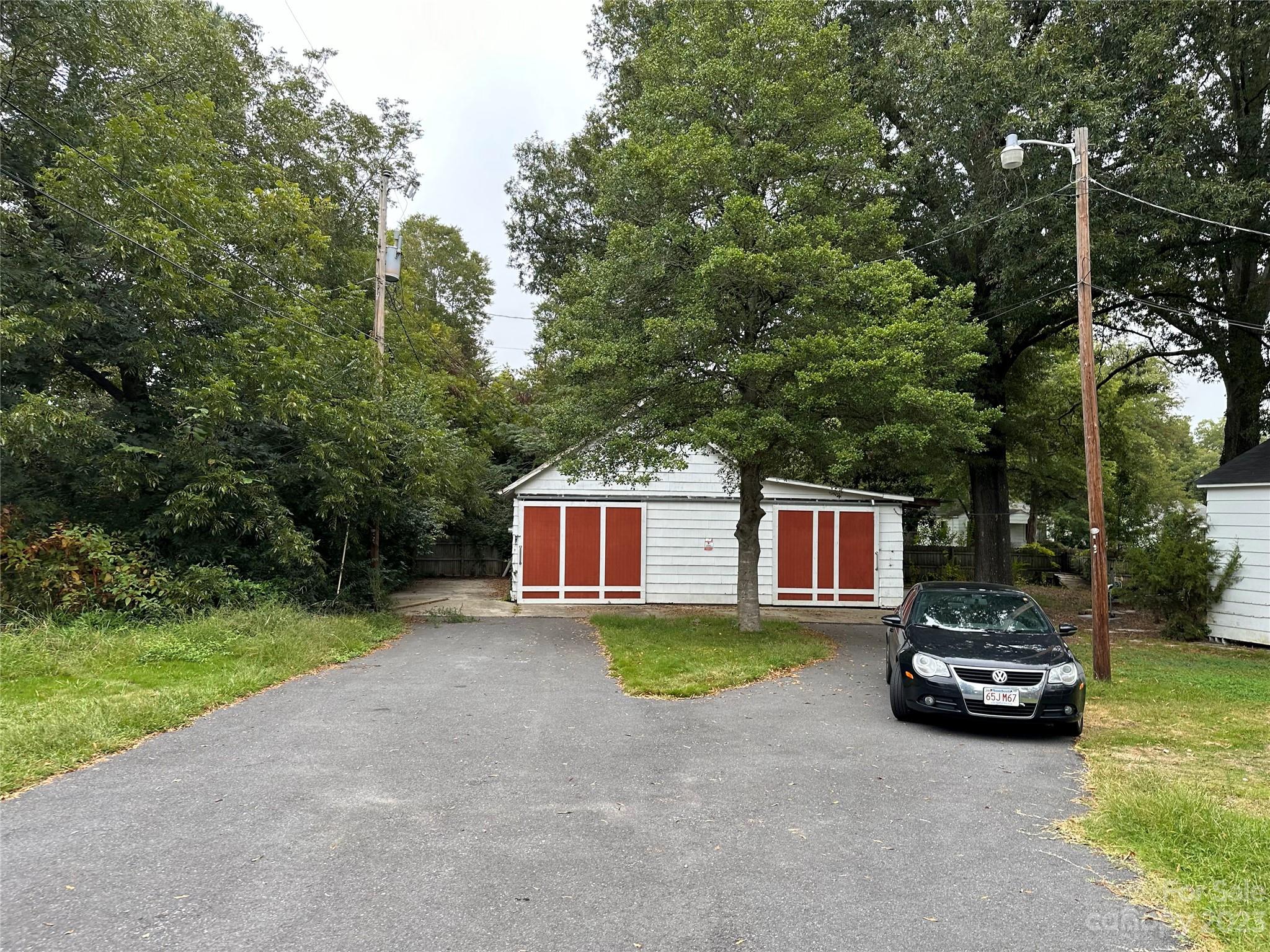 2159 Lesslie Highway Rock Hill, SC 29730 - Photo 2 of 5 a view of a house with a backyard and trees