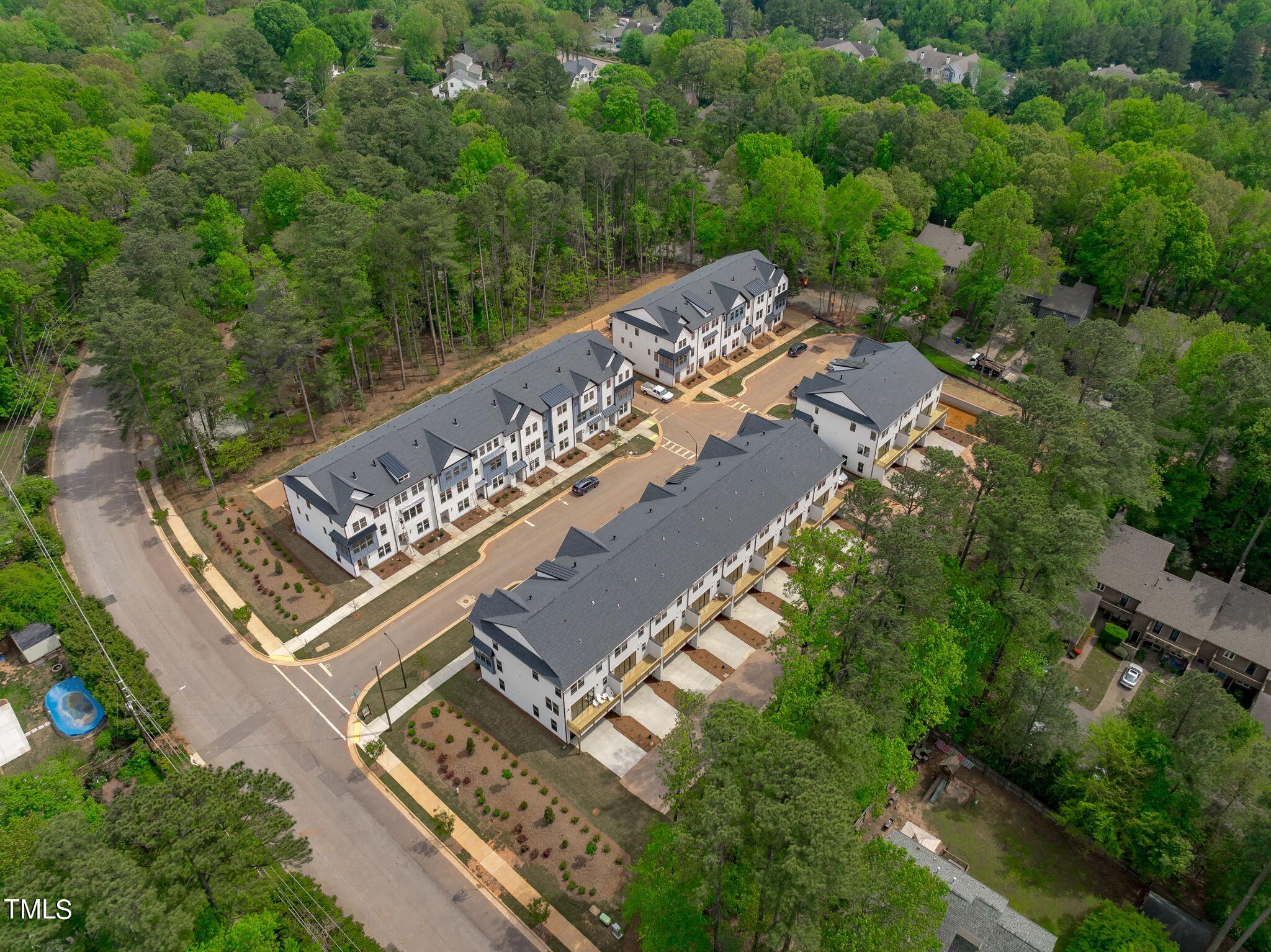 6408 Tanner Oak Lane Raleigh, NC 27613 - Photo 36 of 49 an aerial view of a city
