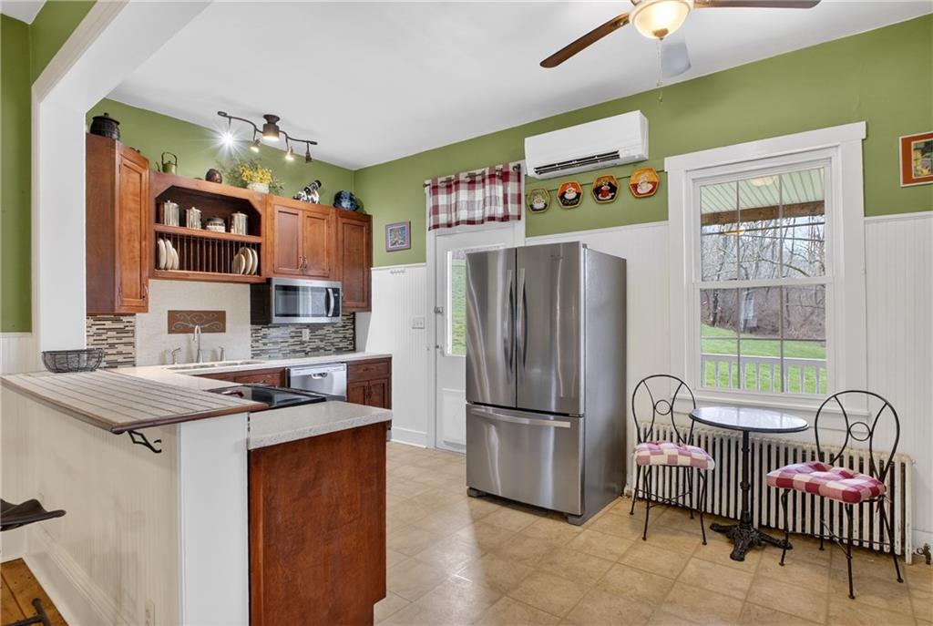 395 McGuffey Road West Alexander, PA 15376 - Photo 18 of 49 Kitchen with a Walk out to The Back Yard and Covered Patio..