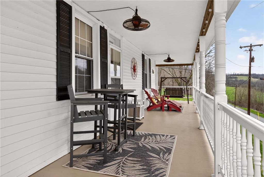 395 McGuffey Road West Alexander, PA 15376 - Photo 8 of 49 Covered Wrapped around Patio 60x7