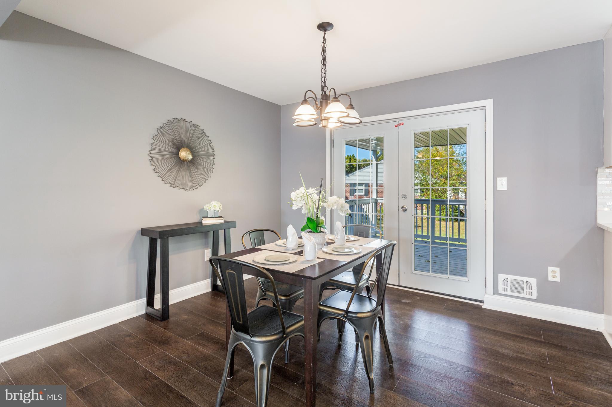 800 Flintlock Drive Bel Air, MD 21015 - Photo 15 of 55 a view of a dining room with furniture window and wooden floor