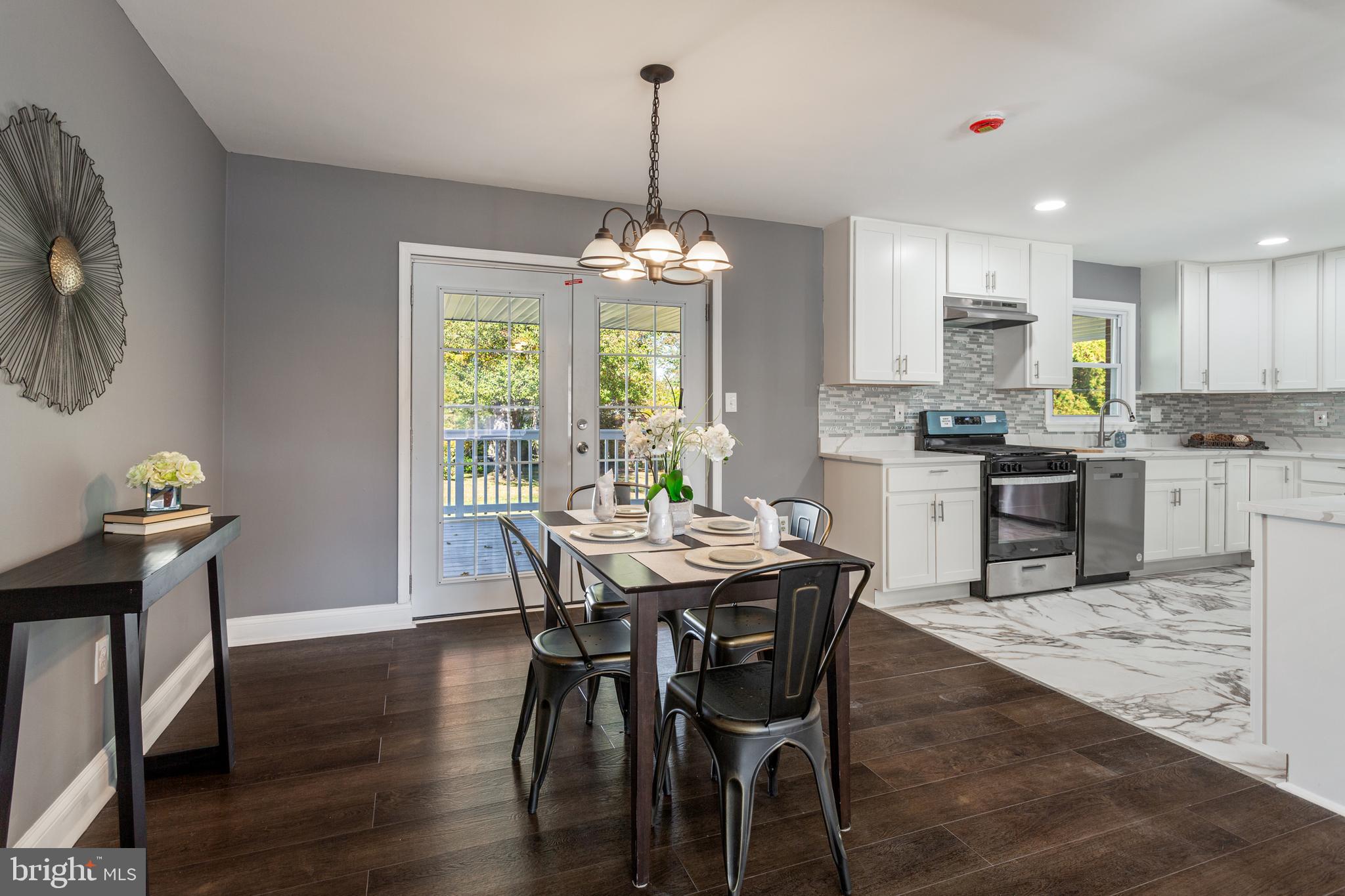 800 Flintlock Drive Bel Air, MD 21015 - Photo 16 of 55 a view of a dining room with furniture window and wooden floor