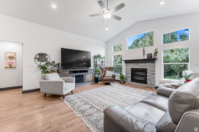 313 Old Maple Road South Weber, UT 84405 - Photo 8 of 35 Vaulted ceilings with a ceiling fan and recessed lighting define this living space