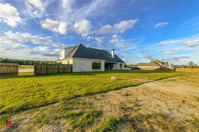a front view of house with yard