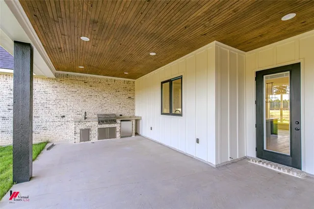 a very nice looking building with glass windows