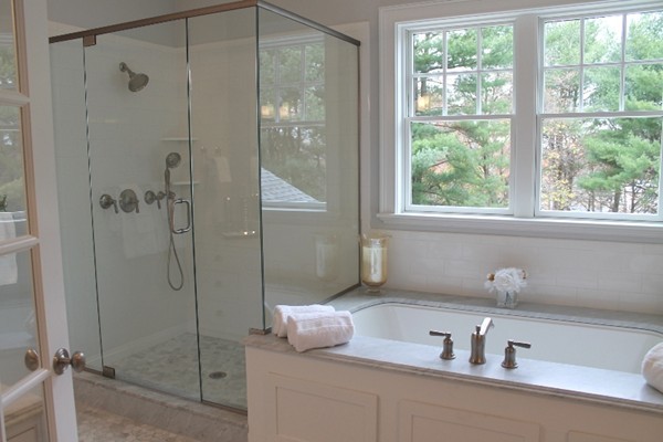 6 Chadbourne Road Lexington, MA 02421 - Photo 22 of 30 a bathroom with a shower sink and mirror