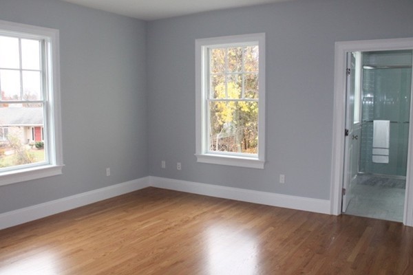 6 Chadbourne Road Lexington, MA 02421 - Photo 24 of 30 an empty room with wooden floor and windows