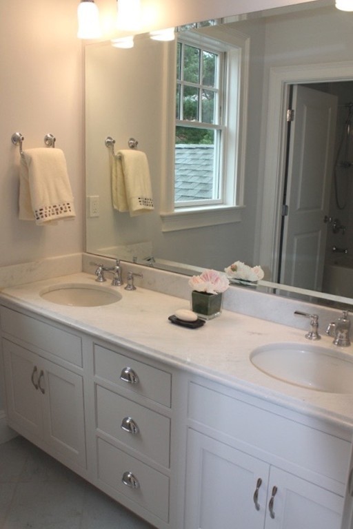 6 Chadbourne Road Lexington, MA 02421 - Photo 26 of 30 a bathroom with double vanity sink and mirror