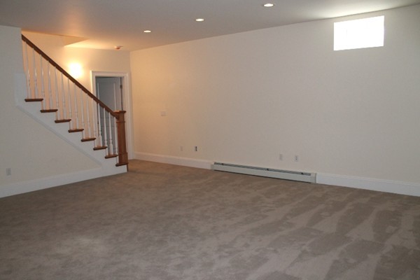 6 Chadbourne Road Lexington, MA 02421 - Photo 30 of 30 a view of an empty room with stairs