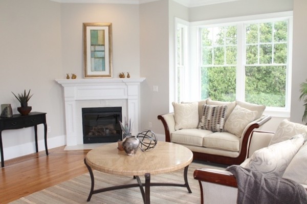 6 Chadbourne Road Lexington, MA 02421 - Photo 3 of 30 a living room with furniture a fireplace and a window