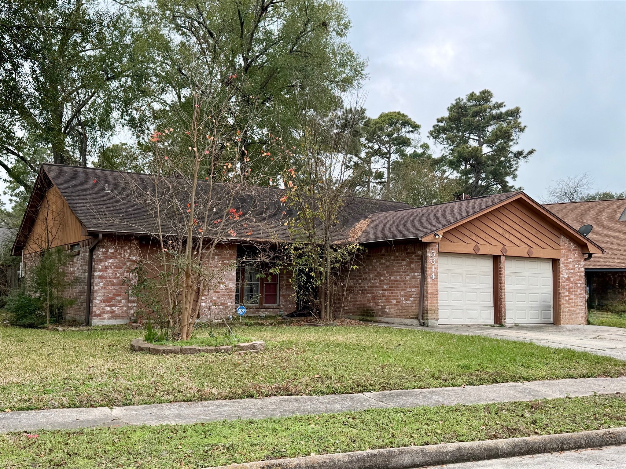 5314 Sweetwind Lane Spring, TX 77373 - Photo 3 of 7 front view of a house with a yard