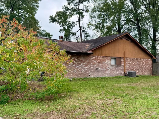 a view of a backyard with a small cabin