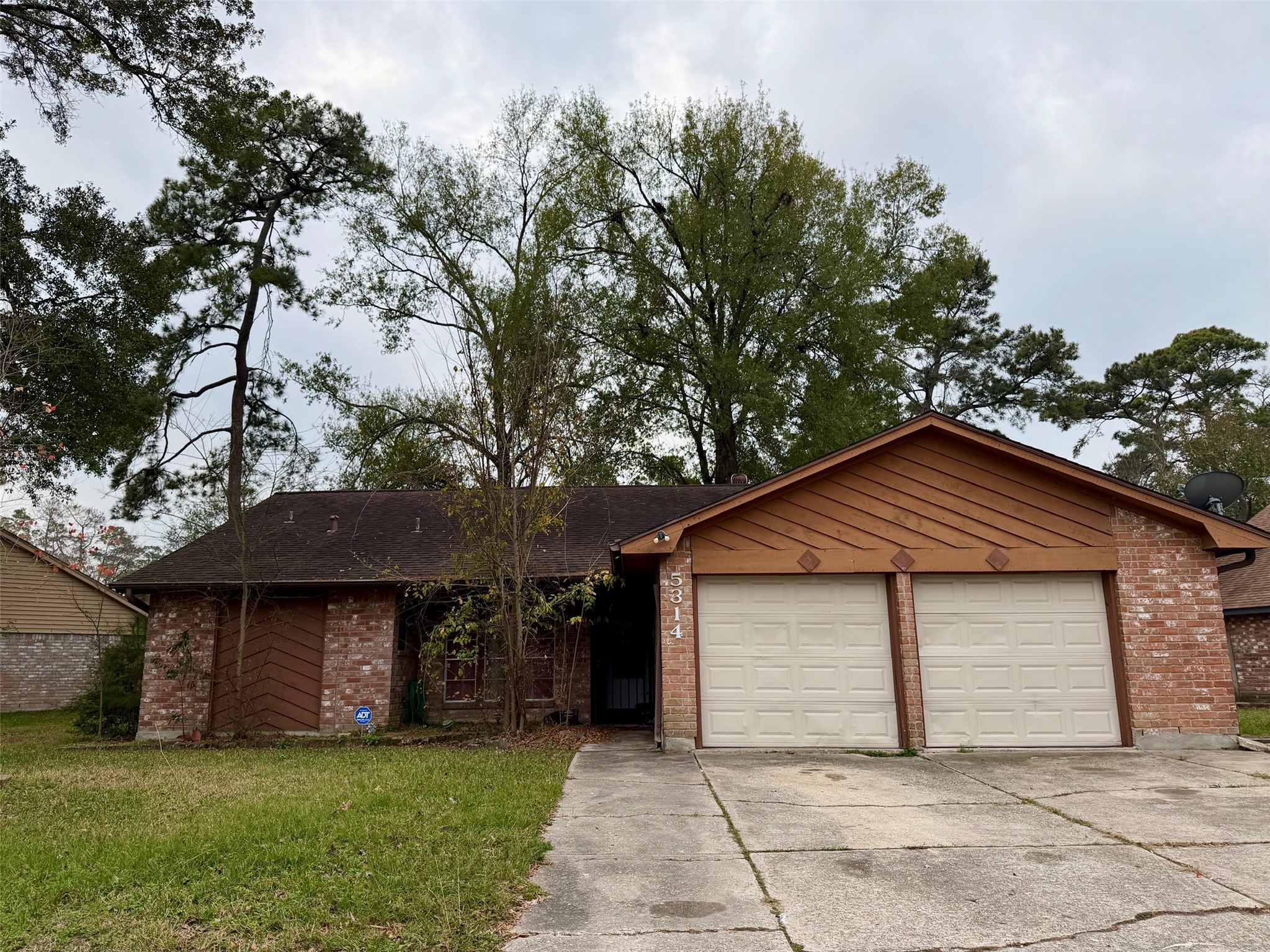 5314 Sweetwind Lane Spring, TX 77373 - Photo 7 of 7 a house that has a tree in front of the house