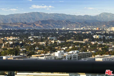 a workspace with furniture and a fireplace