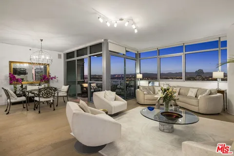 a workspace with furniture and a fireplace