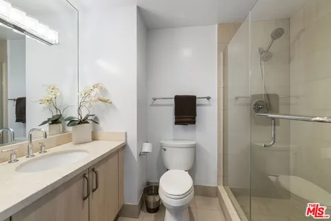 a view of a swimming pool with a lounge chair