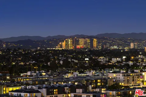 a view of dinning table and chairs in patio