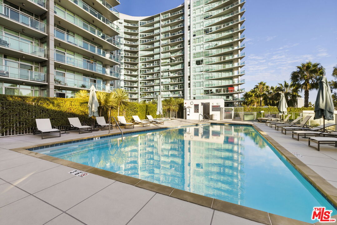 13650 Marina Pointe Drive, Unit 1806 Marina del Rey, CA 90292 - Photo 47 of 65 a view of swimming pool with outdoor seating