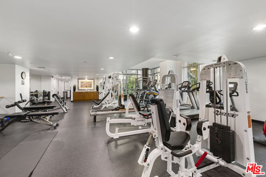 13650 Marina Pointe Drive, Unit 1806 Marina del Rey, CA 90292 - Photo 49 of 65 a view of a room with gym equipment
