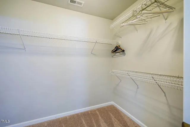 a view of small space with racks on the wall