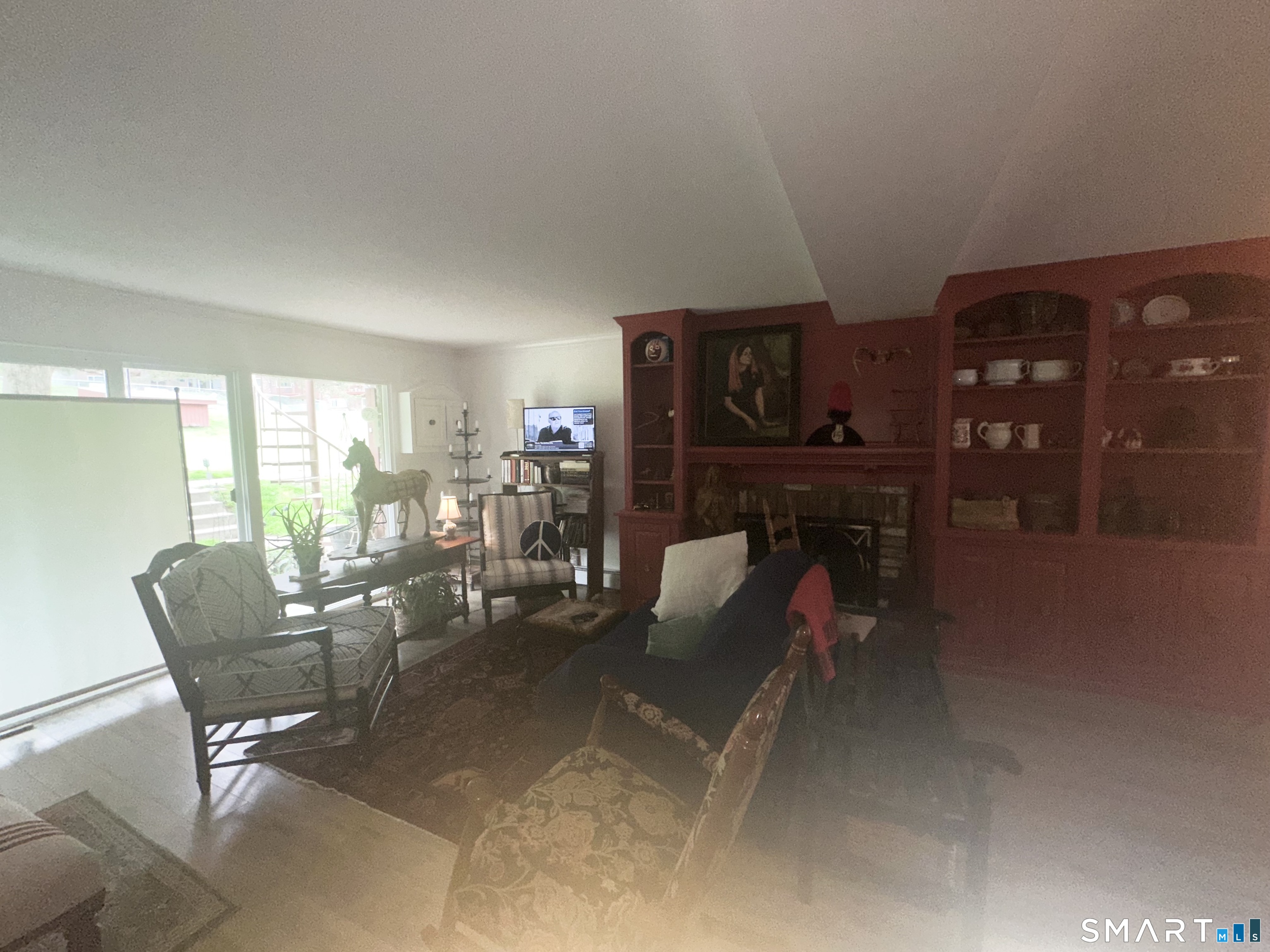 126 Sherman Hill Road, Unit C14 Woodbury, CT 06798 - Photo 16 of 27 a living room with furniture and a large window