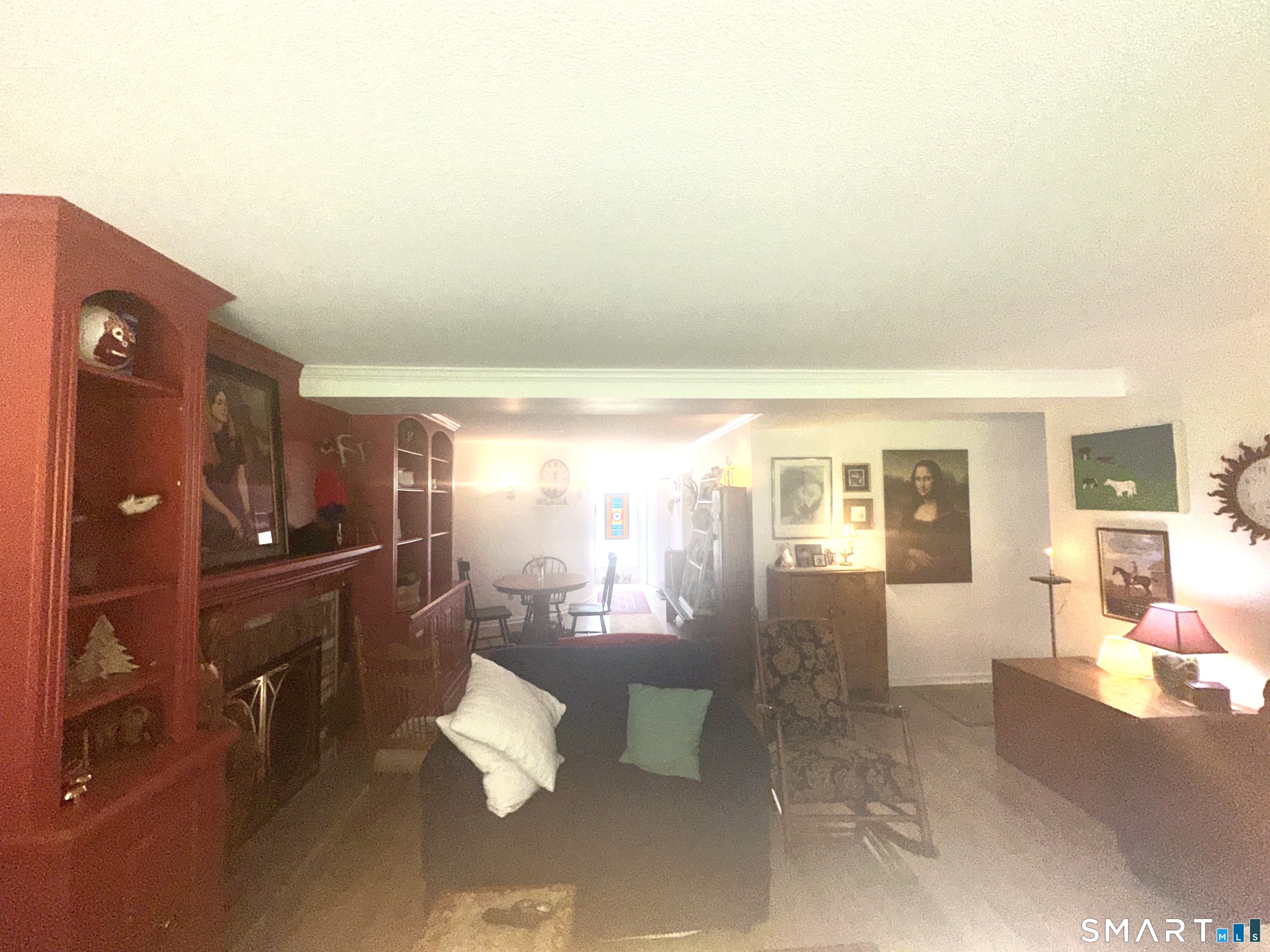 126 Sherman Hill Road, Unit C14 Woodbury, CT 06798 - Photo 21 of 27 a lobby with furniture and floor to ceiling window