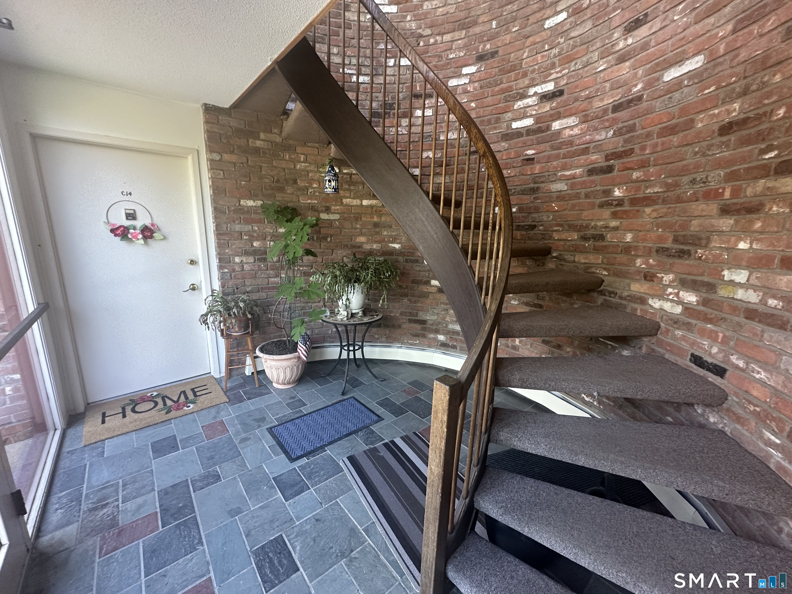 126 Sherman Hill Road, Unit C14 Woodbury, CT 06798 - Photo 5 of 27 a view of entryway and hall