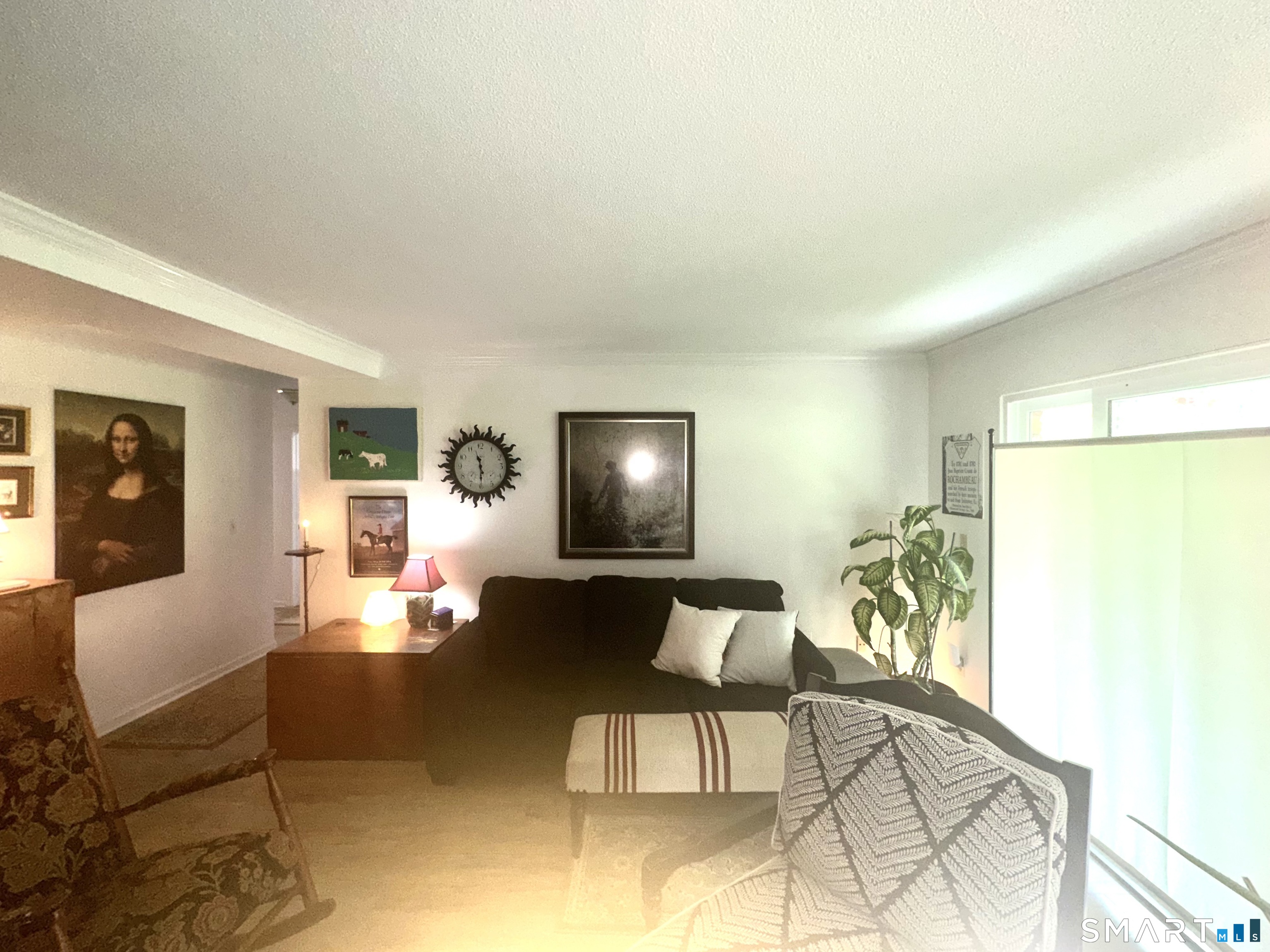 126 Sherman Hill Road, Unit C14 Woodbury, CT 06798 - Photo 6 of 27 a living room with furniture and wooden floor