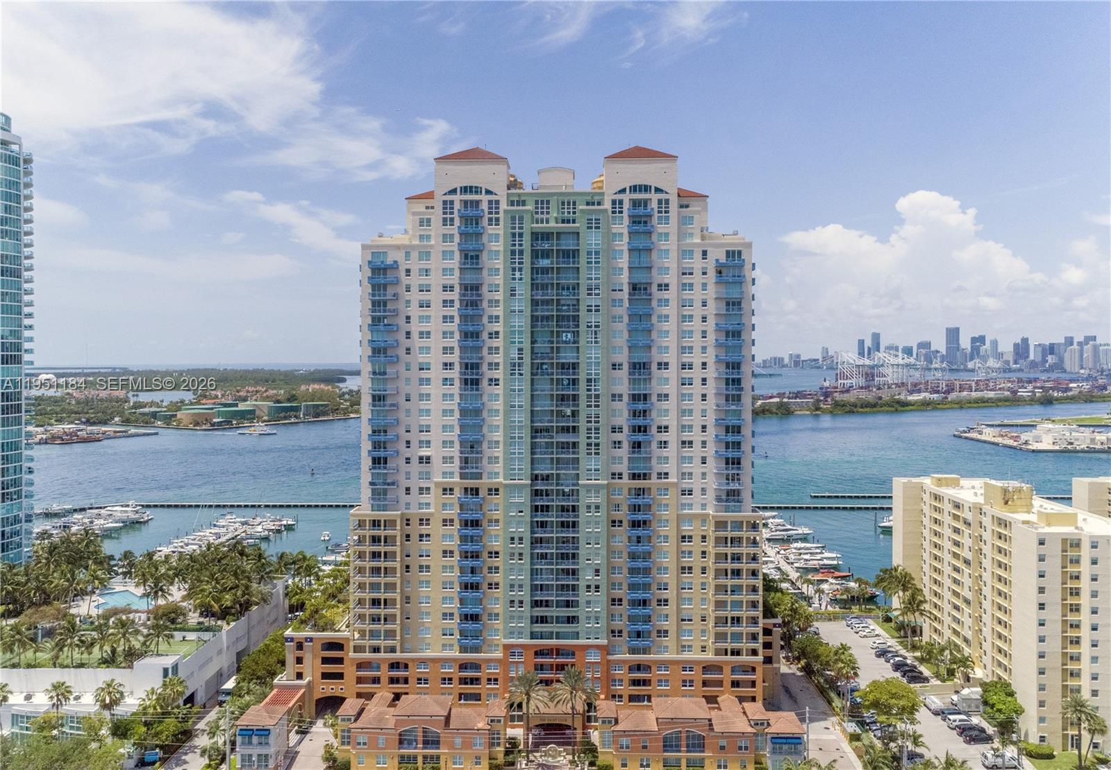 90 Alton Road, Unit TH1 Miami Beach, FL 33139 - Photo 27 of 48 a view of a city with a lake