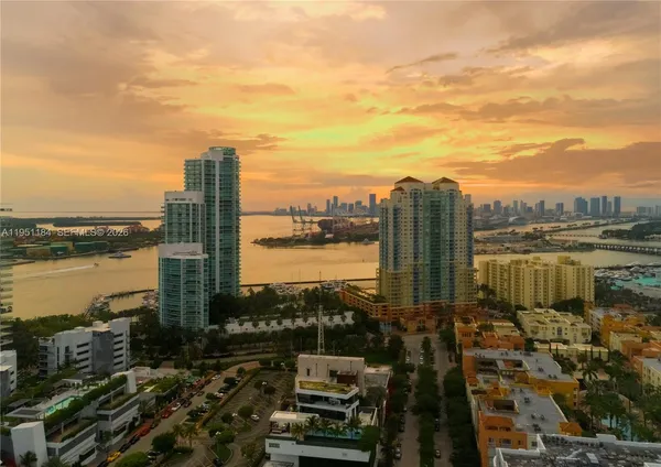 a view of a city with tall buildings