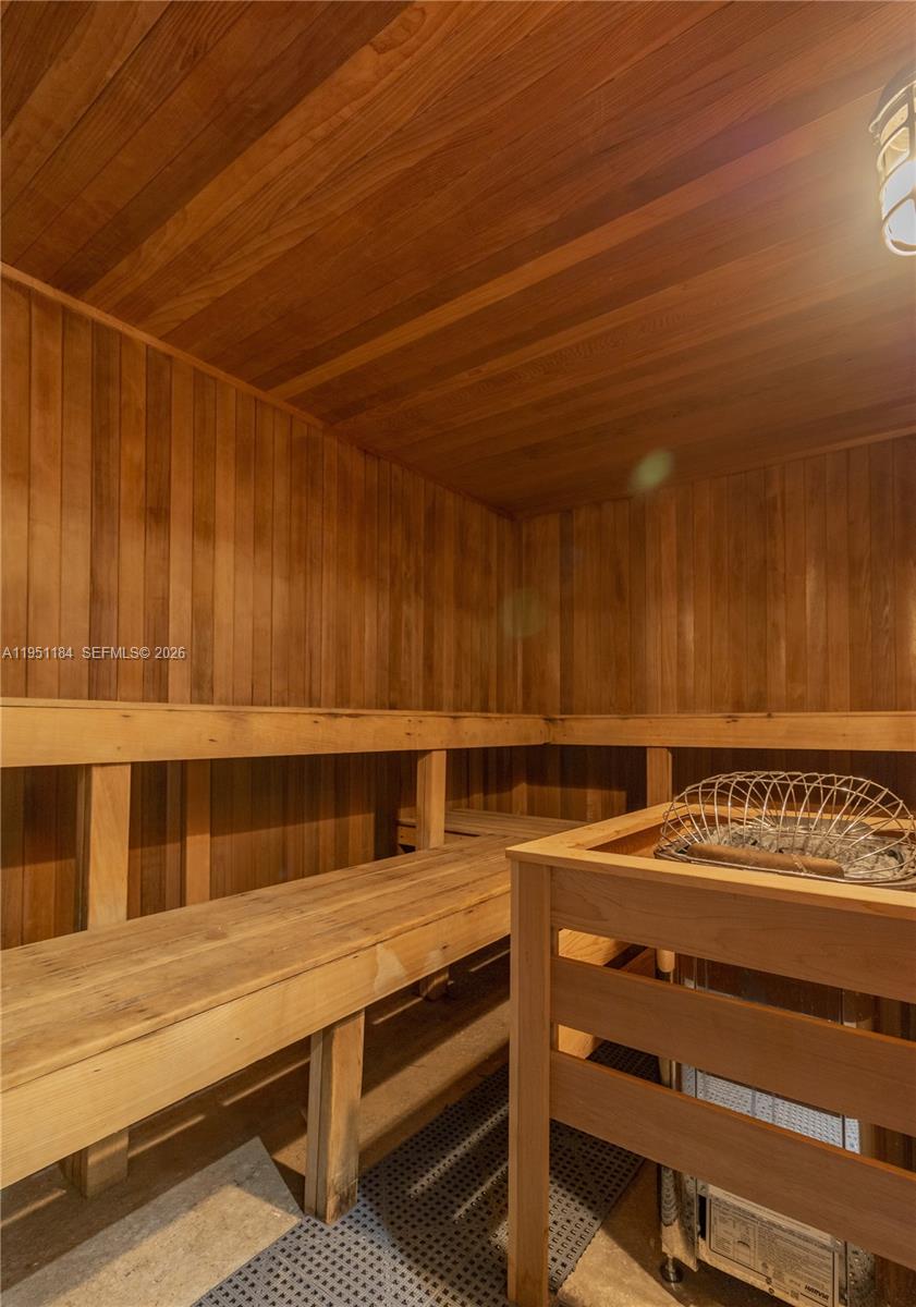 90 Alton Road, Unit TH1 Miami Beach, FL 33139 - Photo 38 of 48 a view of a room with wooden walls