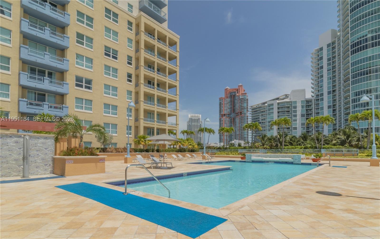 90 Alton Road, Unit TH1 Miami Beach, FL 33139 - Photo 44 of 48 a building with view of building