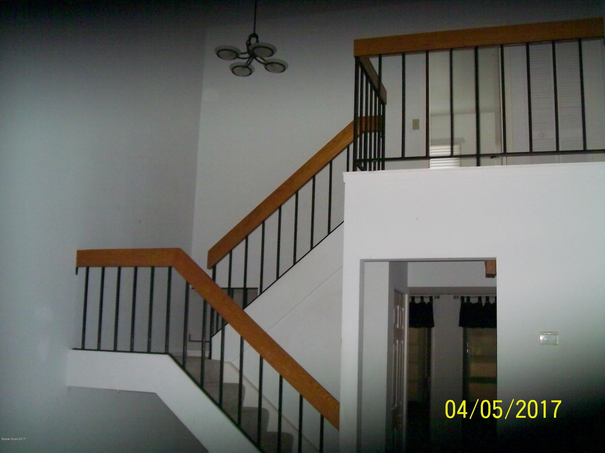 1663 Dawes Road Northeast Palm Bay, FL 32905 - Photo 2 of 10 Stairway to Bedrooms