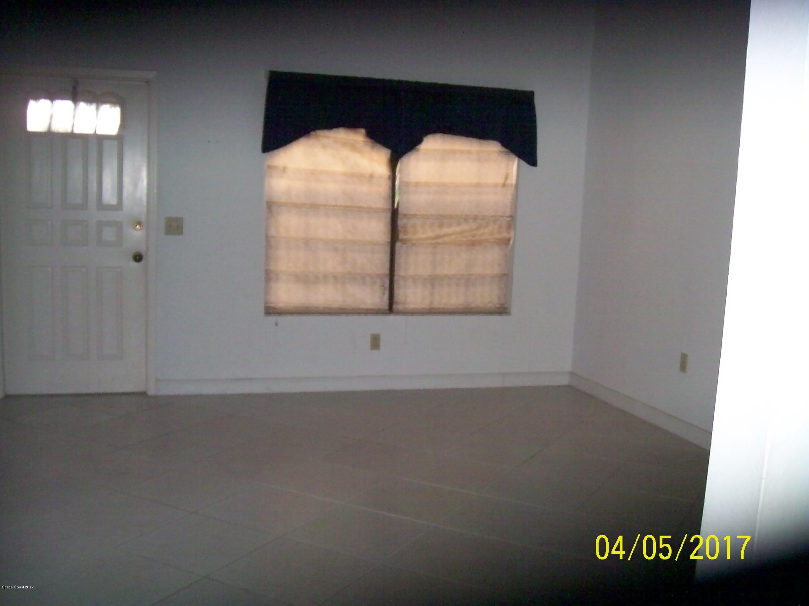 1663 Dawes Road Northeast Palm Bay, FL 32905 - Photo 3 of 10 Living Rm