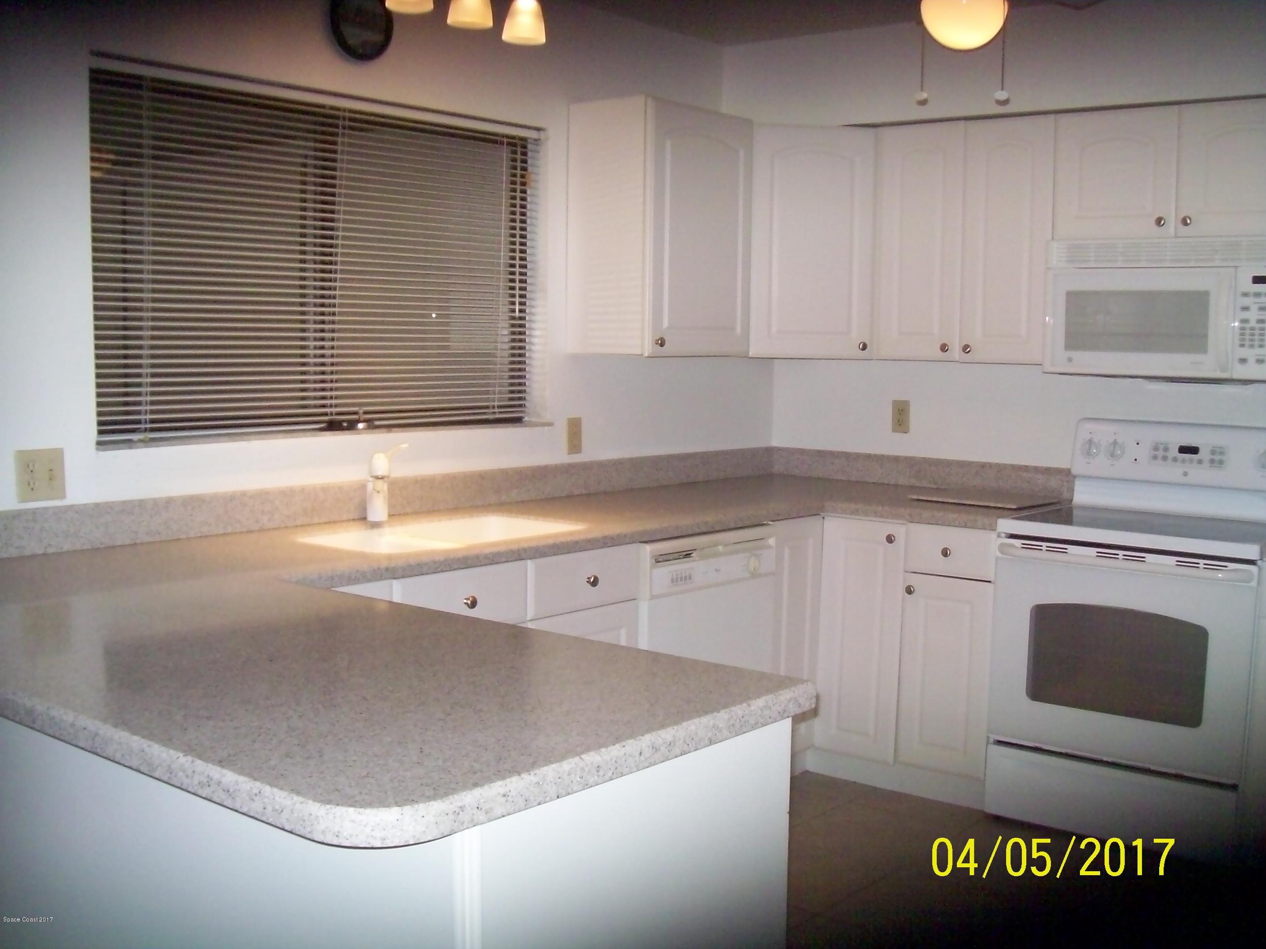 1663 Dawes Road Northeast Palm Bay, FL 32905 - Photo 5 of 10 Kitchen View 2