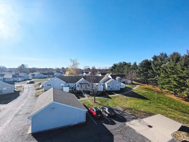 an aerial view of a house with a garden