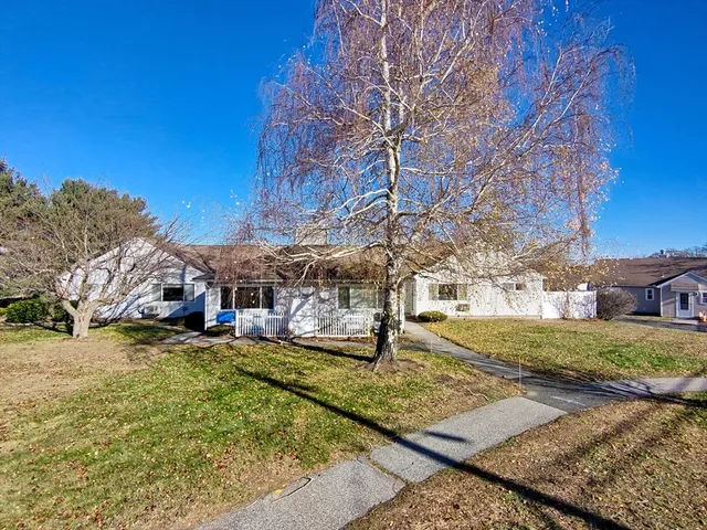 a view of a town with barn house