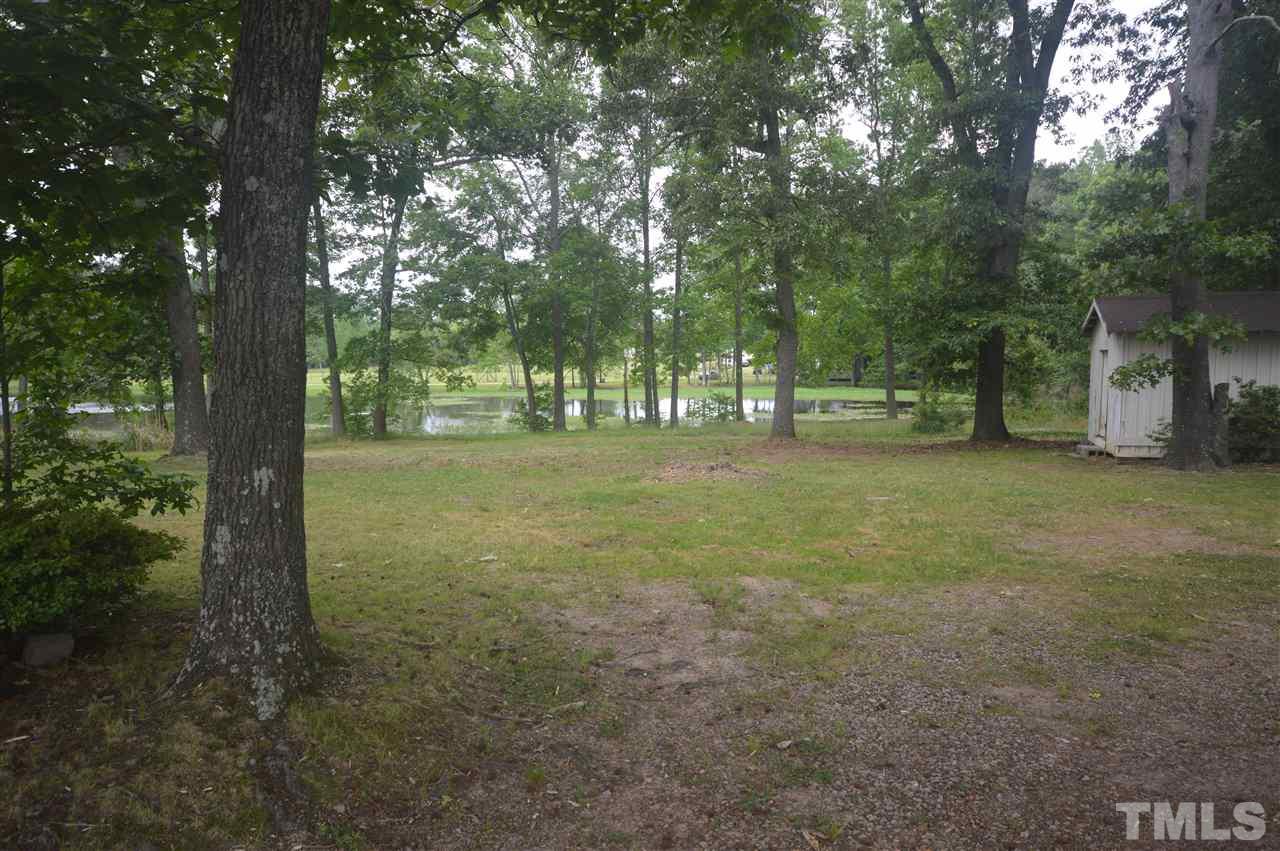 329 Clinton Carlyle Road Zebulon, NC 27597 - Photo 16 of 24 a view of a trees in a yard