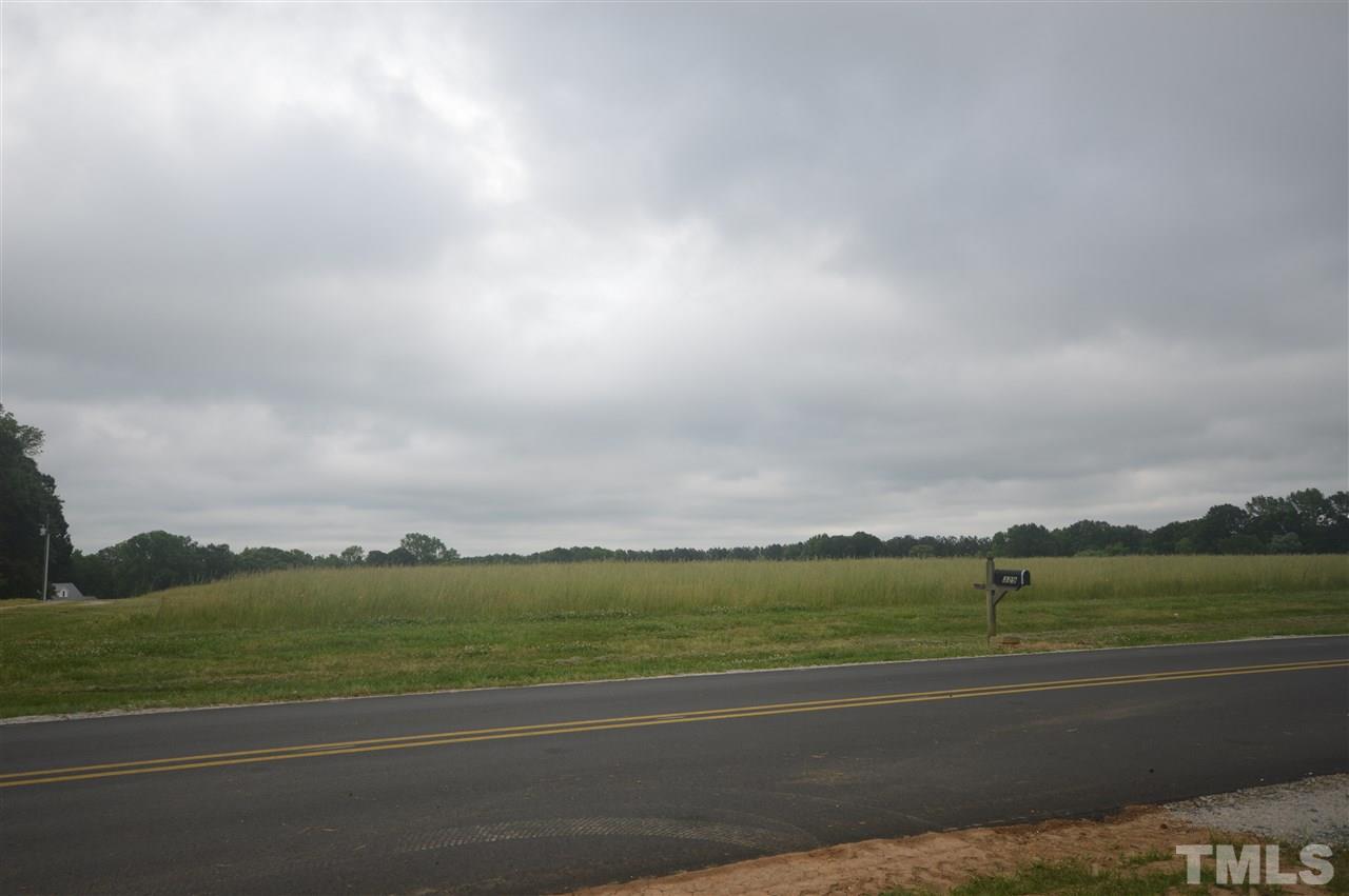 329 Clinton Carlyle Road Zebulon, NC 27597 - Photo 20 of 24 a view of city and lake