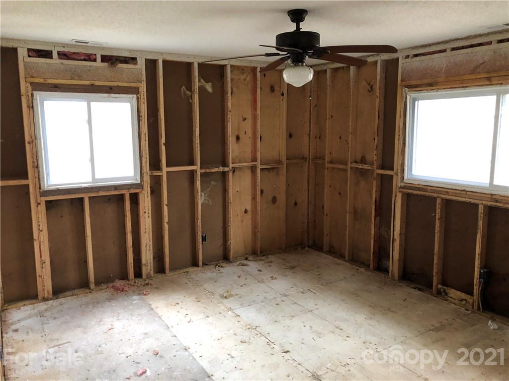 1420 Riverside Drive Charlotte, NC 28214 - Photo 11 of 13 an empty room with windows