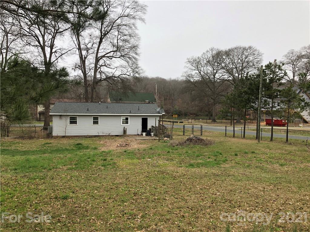 1420 Riverside Drive Charlotte, NC 28214 - Photo 13 of 13 a view of a house with a yard