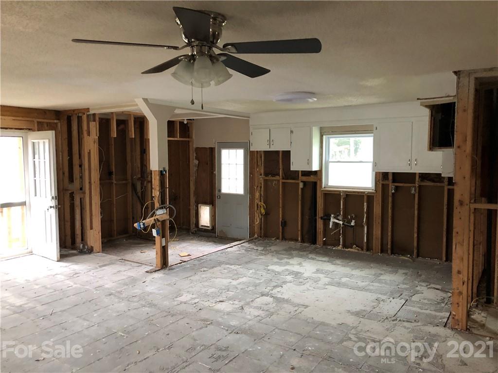 1420 Riverside Drive Charlotte, NC 28214 - Photo 8 of 13 an empty room with closet and windows