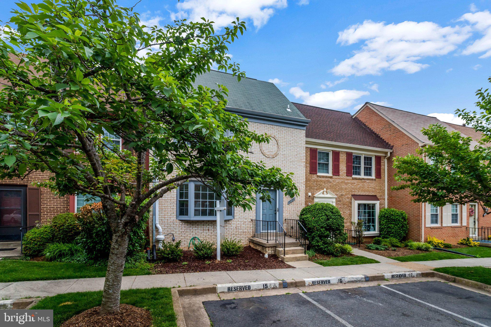 2225 North Tuckahoe Street Arlington, VA 22205 - Photo 2 of 37 a front view of a house with a yard and tree s