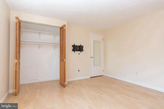 an empty room with closet