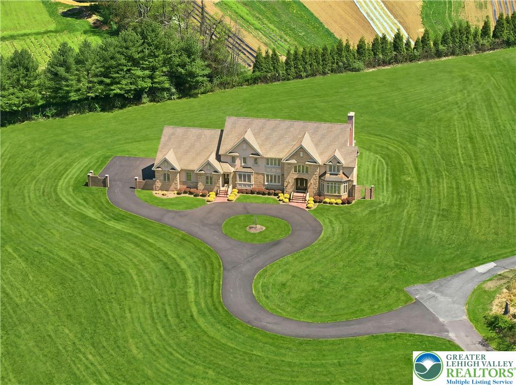 3200 Creamery Road New Hope, PA 18938 - Photo 38 of 42 an aerial view of a house with backyard outdoor seating and green space
