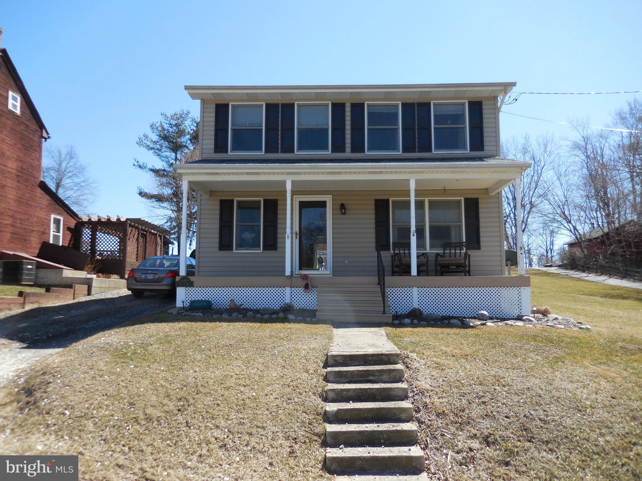 16613 Trenton Road Upperco, MD 21155 - Photo 1 of 15 a front view of a house with a yard